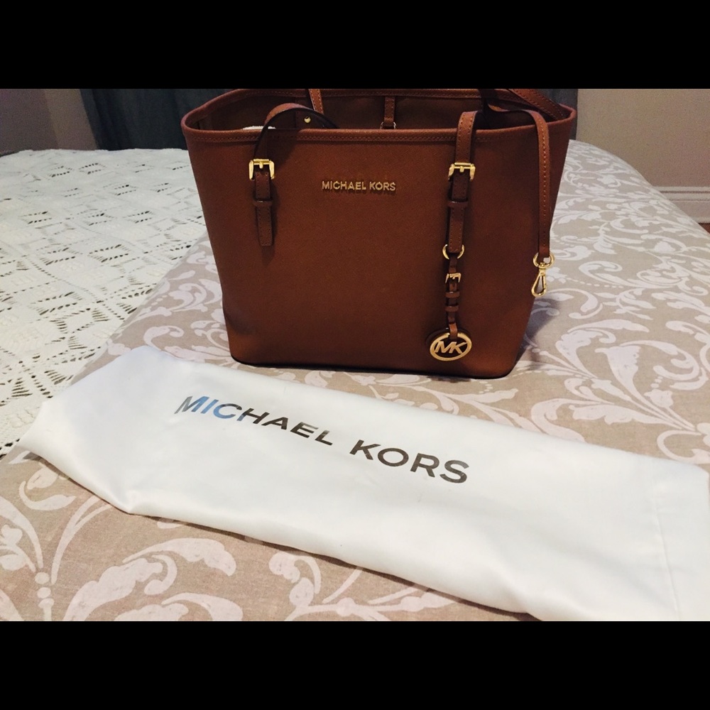 A brown MK bag